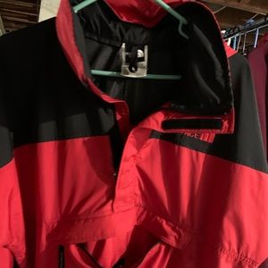 The North Face black/red Half Zip Windbreaker.